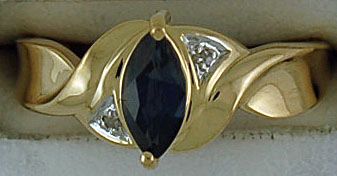 Ladies Twist Style Diamond and Sapphire Ring
