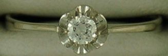 1/6ct Flower Solitaire Ring