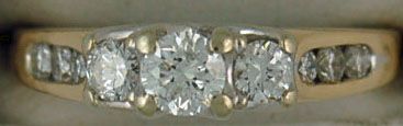 3/4ctw Past, Present and Future Roud Cut Diamond Ring