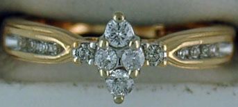 Ladies 1/4ctw Marquise Shape Diamond Cluster ring