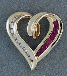 1/4ctgw Ruby and Diamond Heart Pendant
