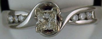 1/4ctw Princess and Round Cut Diamond Engagement Ring