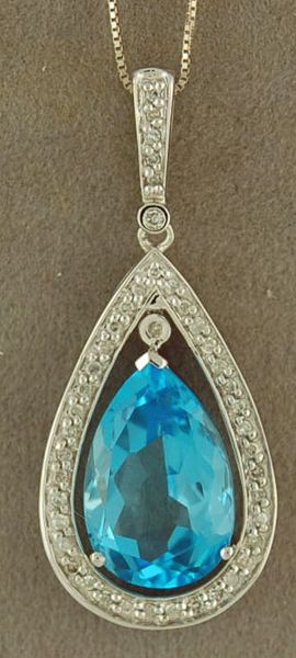 Pear cut Blue Topaz and Diamond Pendant on a Chain