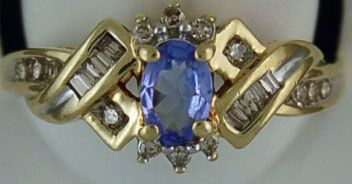 Lady's Purple Stone and Diamond Ring