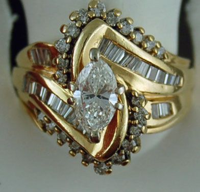 Lady's 1-1/2ctw Marquise, Round and Baguette Diamond Cluster Ring