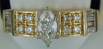 Lady's 5/8ctw Marquise, Round and Baguette Diamond Ring