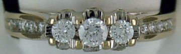 Lady's 3/8ctw Round Cut Diamond Past, Present and Future Ring