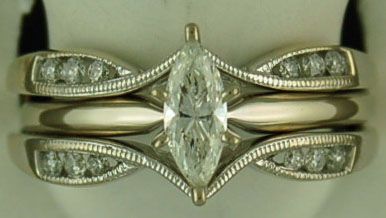 Lady's 1/2ctw Marquise and Round Diamond Ring