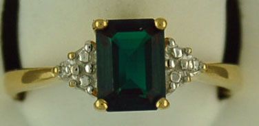 Lady's Emerald Cut Green Stone and Diamond Ring
