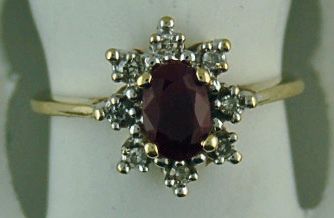 Ruby And 8 Round Brilliant Diamonds 5/8ctw