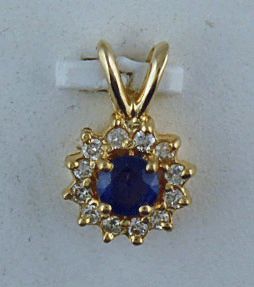 3/8ctgw Diamond And Blue Sapphire Pendant