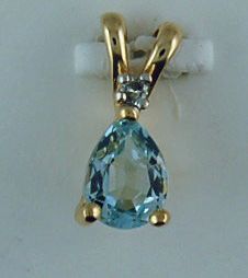 Diamond And Blue Stone Pendant