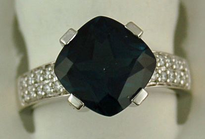 Cushion Cut Blue Topaz With 36 Round Brilliant Diamonds