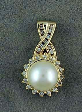 Pear And 26 Round Brilliant Diamonds