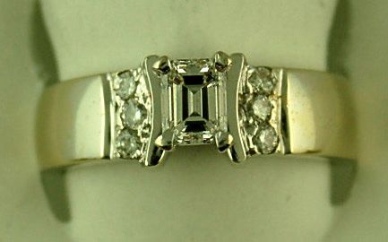 3/8CT Emerald Cut Diamond 6 Round Diamonds