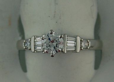 1/2CT With 2 Round And 6 Baguette diamonds