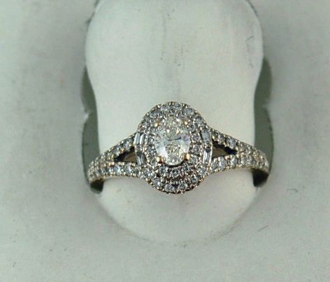 1/3CT Oval Diamond With 4 Baguette And 92 Round Diamonds 3/4CTW