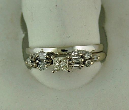 Princess Solitaire With 6 Round And 6 Baguette Band 3/8ctw