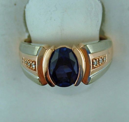 Blue Oval Stone With 6 Diamonds