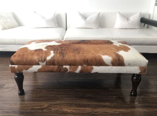 Faux on sale cowhide ottoman