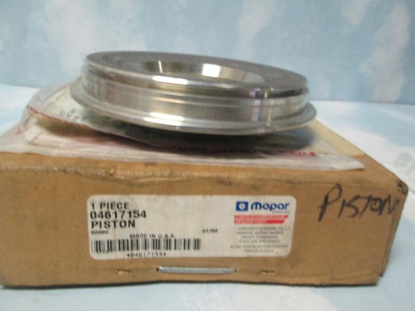 04617154 MOPAR FRONT OEM PISTON CLUTCH NEW 99-10