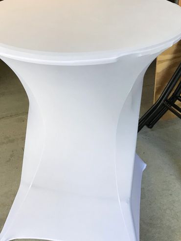 Cocktail table with white spandex linen