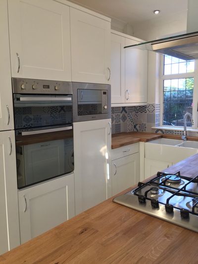 A contemporary kitchen Installation completed by Philip Adams Interiors.