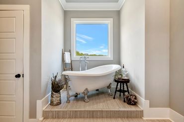 <img src="vessel bathtub.jpg" alt="vessel bathtub in master bath">