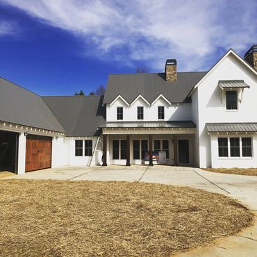 <img src="farmhouse.jpg" alt="white brick farmhouse exterior">