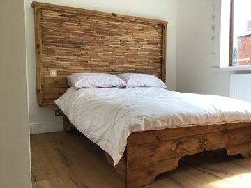 rustic wooden double bed with led lighting