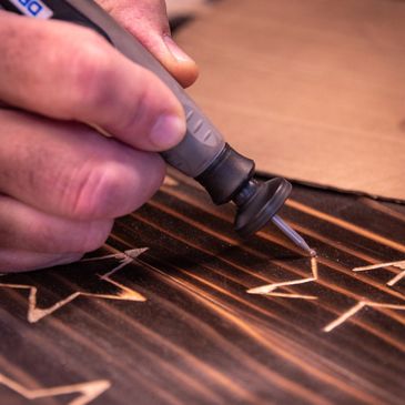 Hand carved wooden American Flags.