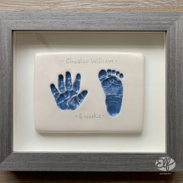 Framed baby clay imprint at 4 weeks old