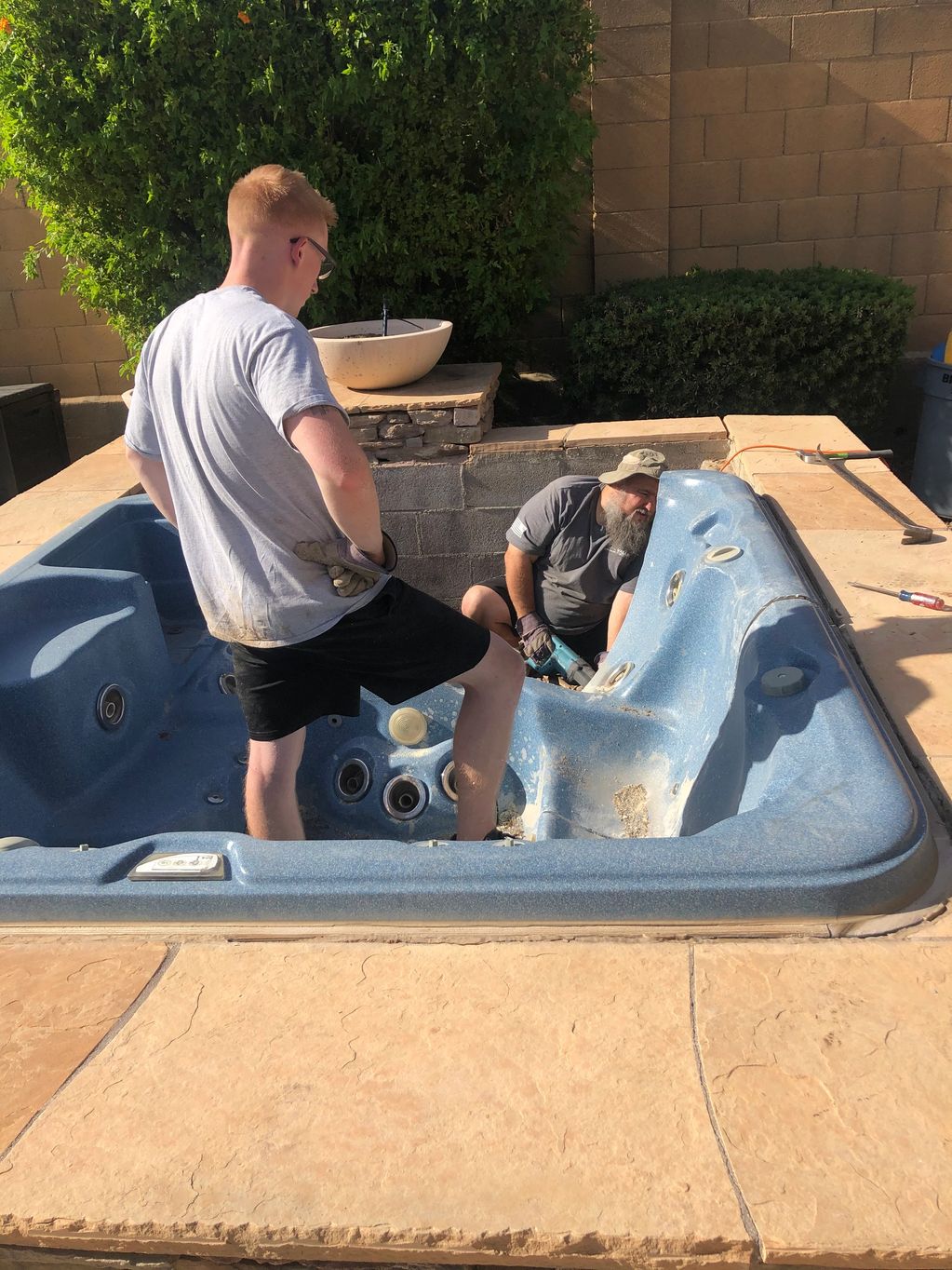 Cutting hot tub for disposal.
Spa removal
Spa move
Hot tub move
Jacuzzi removal