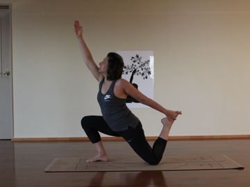 Tanaz - Yogagyms instructor in a pose in the yoga studio