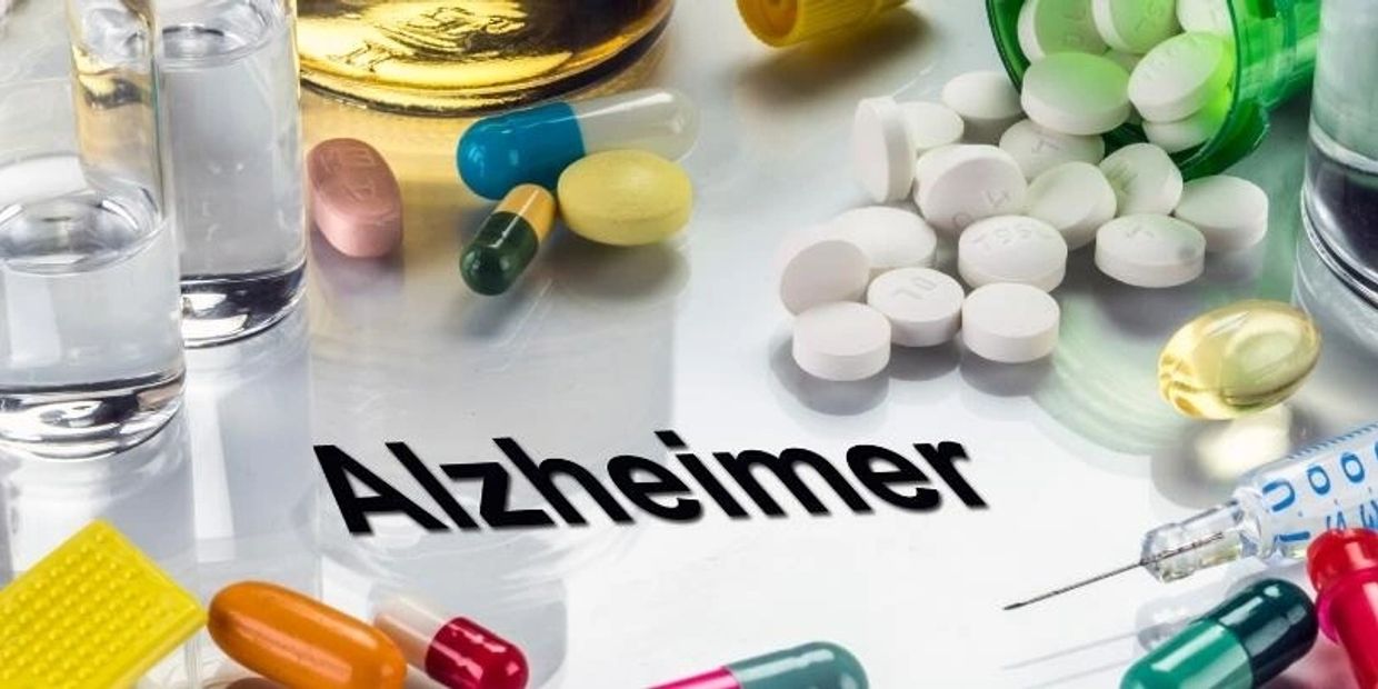 A picture with tablets and injection for Alzheimer's disease.