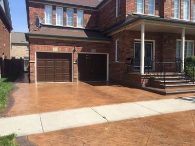 Stamped Concrete Sealing Completed with wet look sealer and non slip additive.