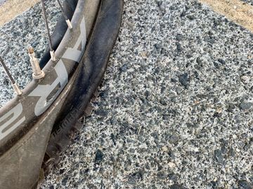 Bike wheel with punctured flat tyre