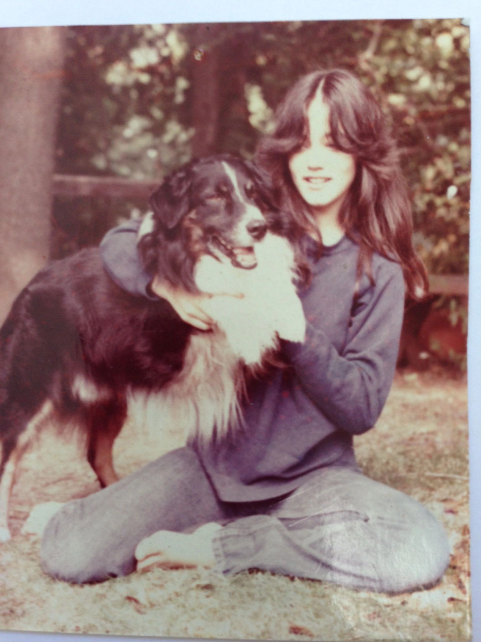 Ellie with her childhood dog Simon, who guides her Animal Communication and is always with her.