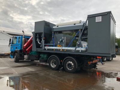 Mobile Centrifuge on the back of a lorry.