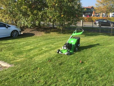 Lawnmower cutting grass