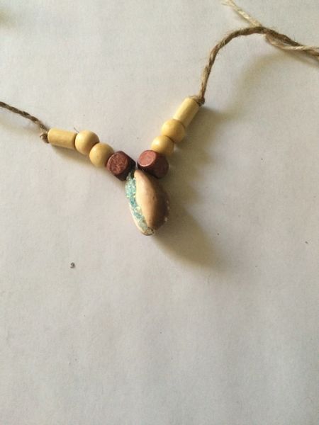 Cowrie fertility talisman