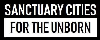 Sign saying 'Sanctuary Cities for the Unborn'.