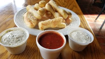Breadstix and pizza sauce with added cream cheese dip and jalapeño cream cheese dip