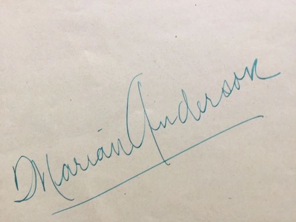 ANDERSON, MARIAN SIGNATURE ON ALBUM PAGE FIRST AFRICAN AMERICAN OPERA CONTRALTO TO APPEAR AT THE NY MET
