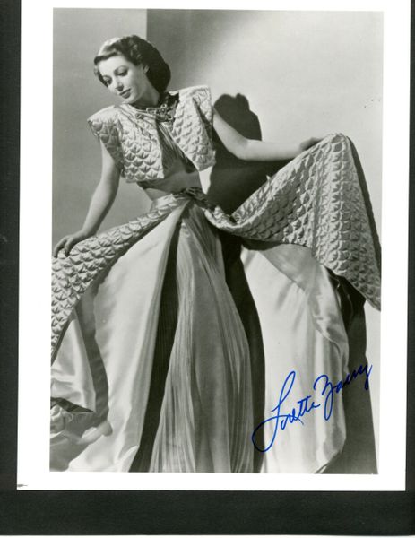 YOUNG, LORETTA BEAUTIFUL SIGNED PHOTO 8 X 10 B/W IN DESIGNER GOWN