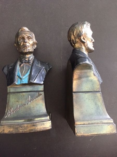 [ABRAHAM LINCOLN] PAIR OF EARLY 20TH CENTURY CAST METAL LINCOLN BUST SCUPTURE BOOK ENDS