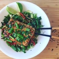 Soy Glazed Mahi-Mahi with Vegetable Pad Thai served in a bowl with chop sticks.