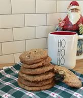 Cookies served with milk for santa.