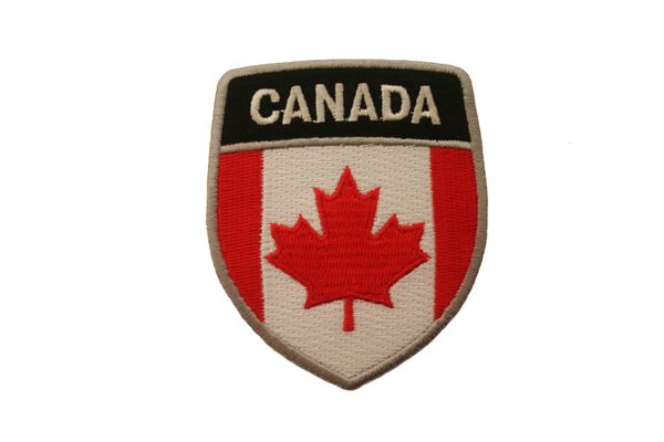 CANADA COUNTRY FLAG OVAL SHIELD EMBROIDERED IRON ON PATCH CREST BADGE WITH SILVER TRIM .. NEW