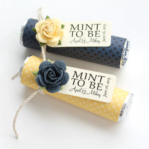 navy and yellow polka dot wedding favors with navy and yellow roses